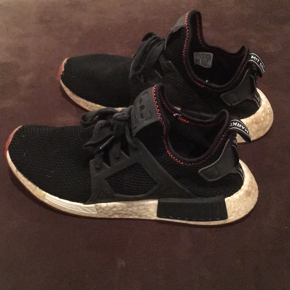 Nmd “black and orange “